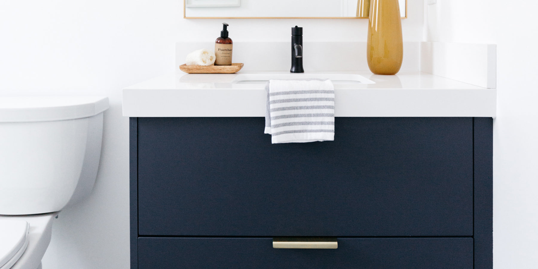 Clean and Crisp Bathroom with Night Sky Slab Fronts