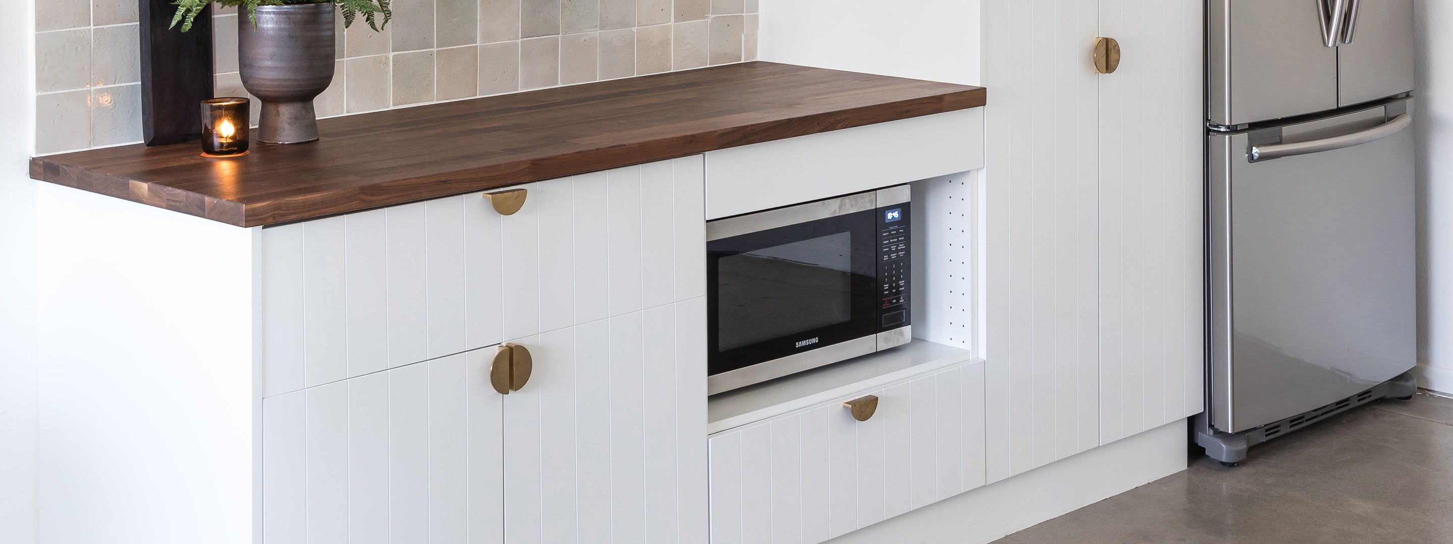 A Lovely, Efficient Workspace Kitchenette with White Beaded Fronts