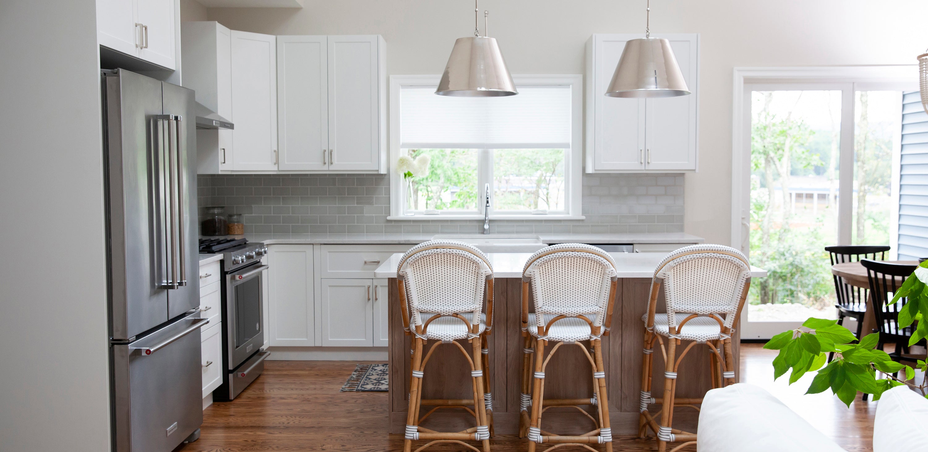An Open Kitchen with Supermatte White and Cove Shaker