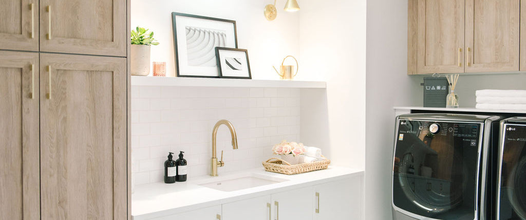 Warm and Inviting Laundry Room with Cove Shaker and White Slab Fronts