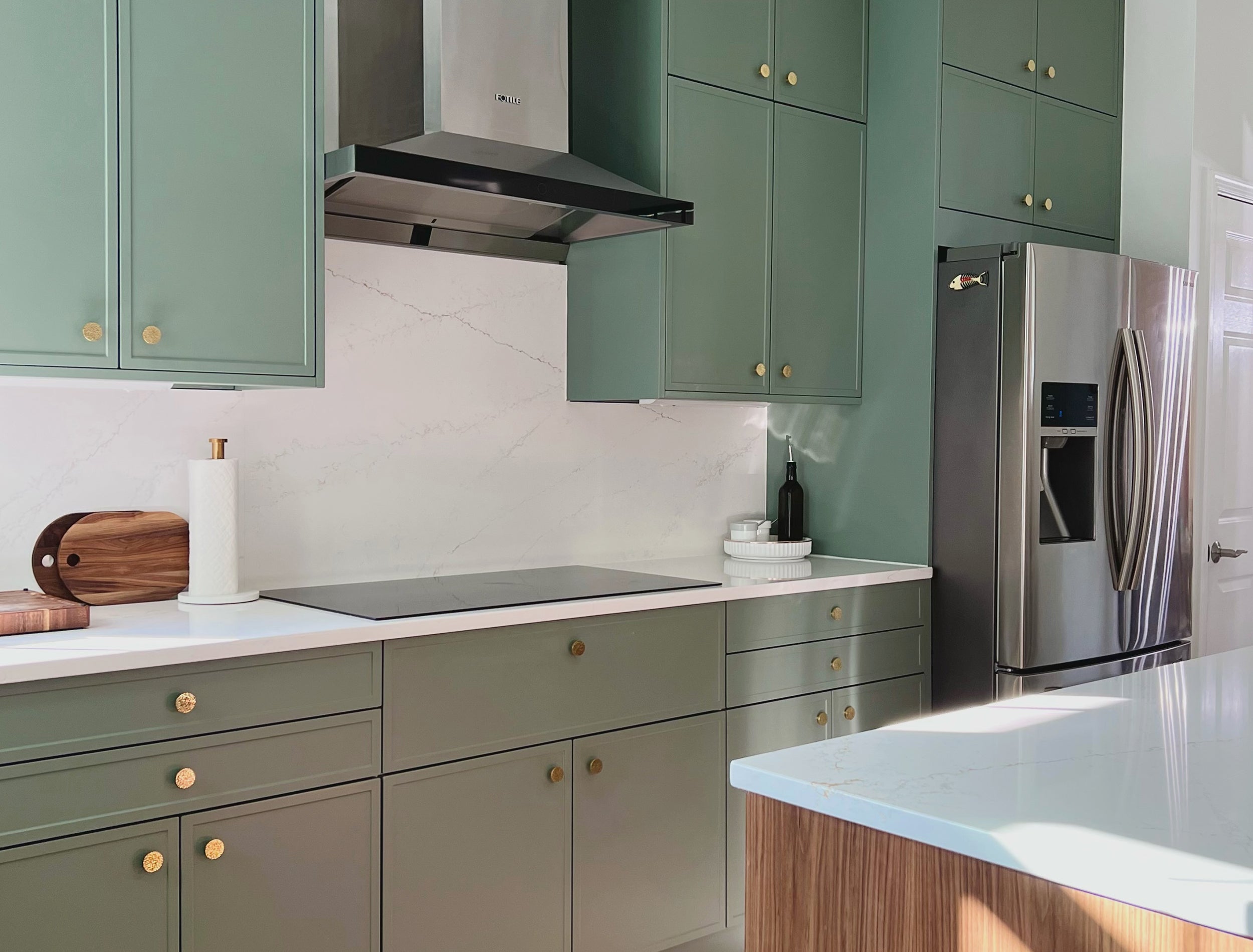 A Sleek Green Kitchen Renovation